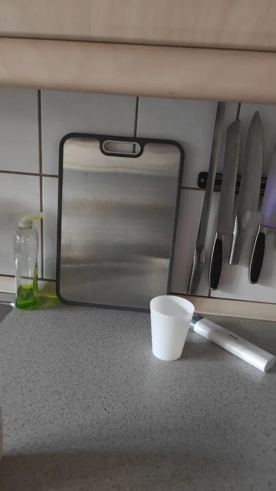 Customer photo review of Cozymere Titanium Cutting Board
