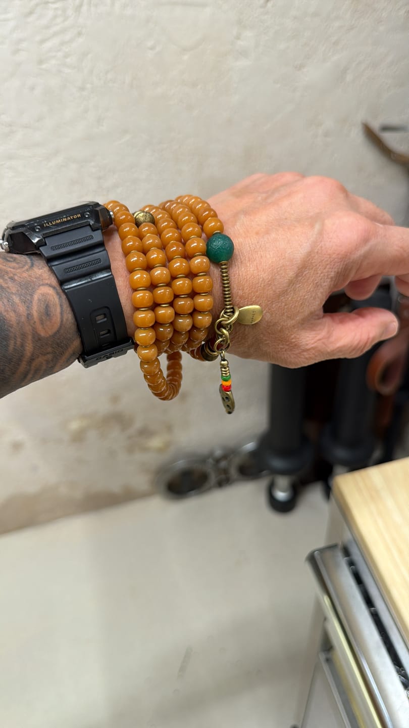 Customer photo review of 108 Bodhi Seed Dzi Copper Charm Mala Necklace