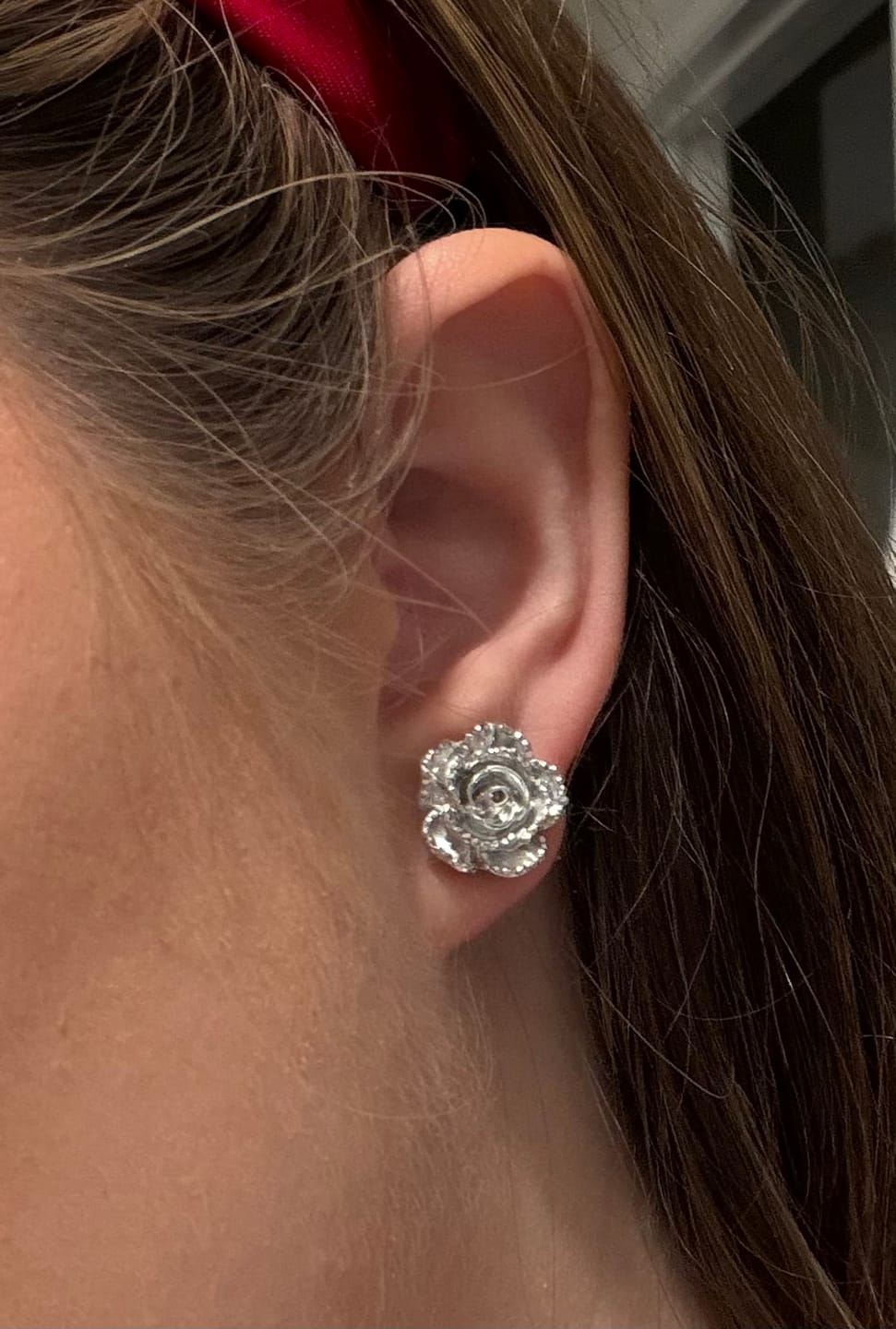 Customer photo review of Metallic Rose Studs Hypoallergenic Earrings for Sensitive Ears with Plastic Posts