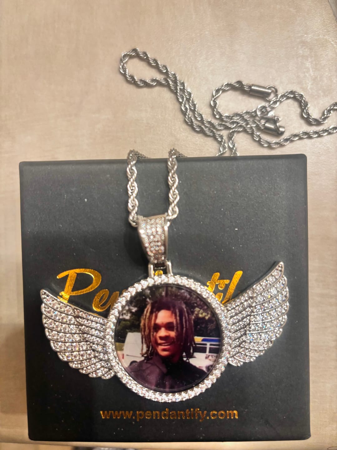 Customer photo review of Custom Diamond Studded Angel Wing Photo Necklace