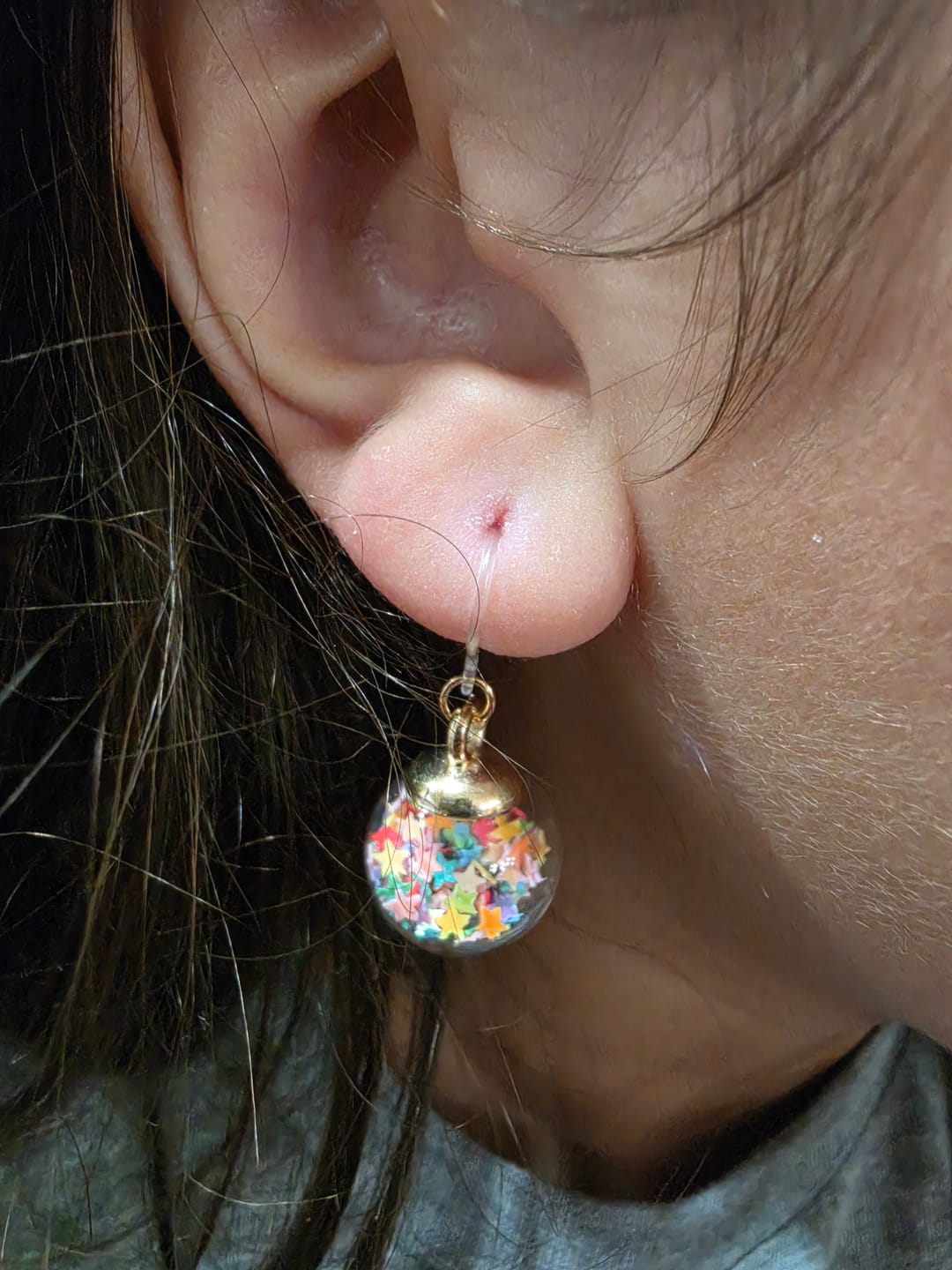 Customer photo review of Wish Upon a Star Dangles Hypoallergenic Earrings for Sensitive Ears with Plastic Posts