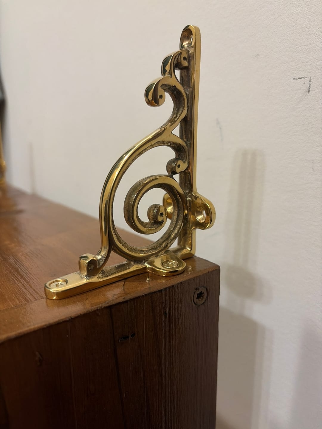Customer photo review of Swirl Shelf Bracket - Unlacquered Brass Polished