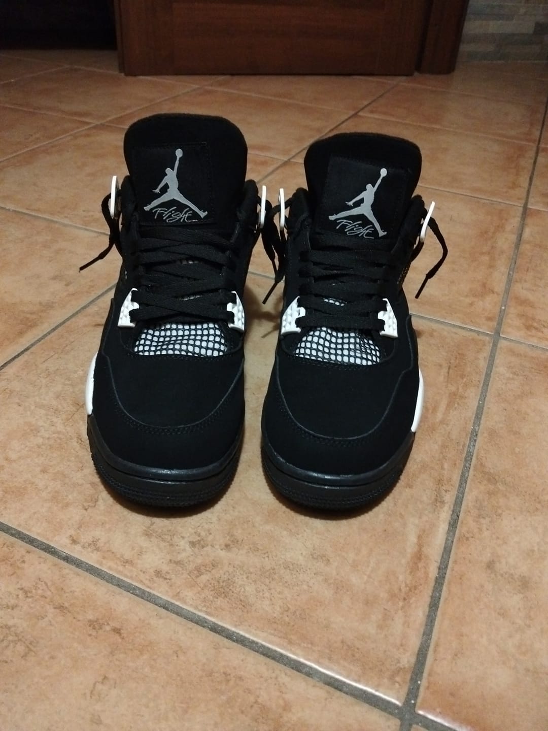Customer photo review of Nike Air Jordan 4 Retro "Fear"