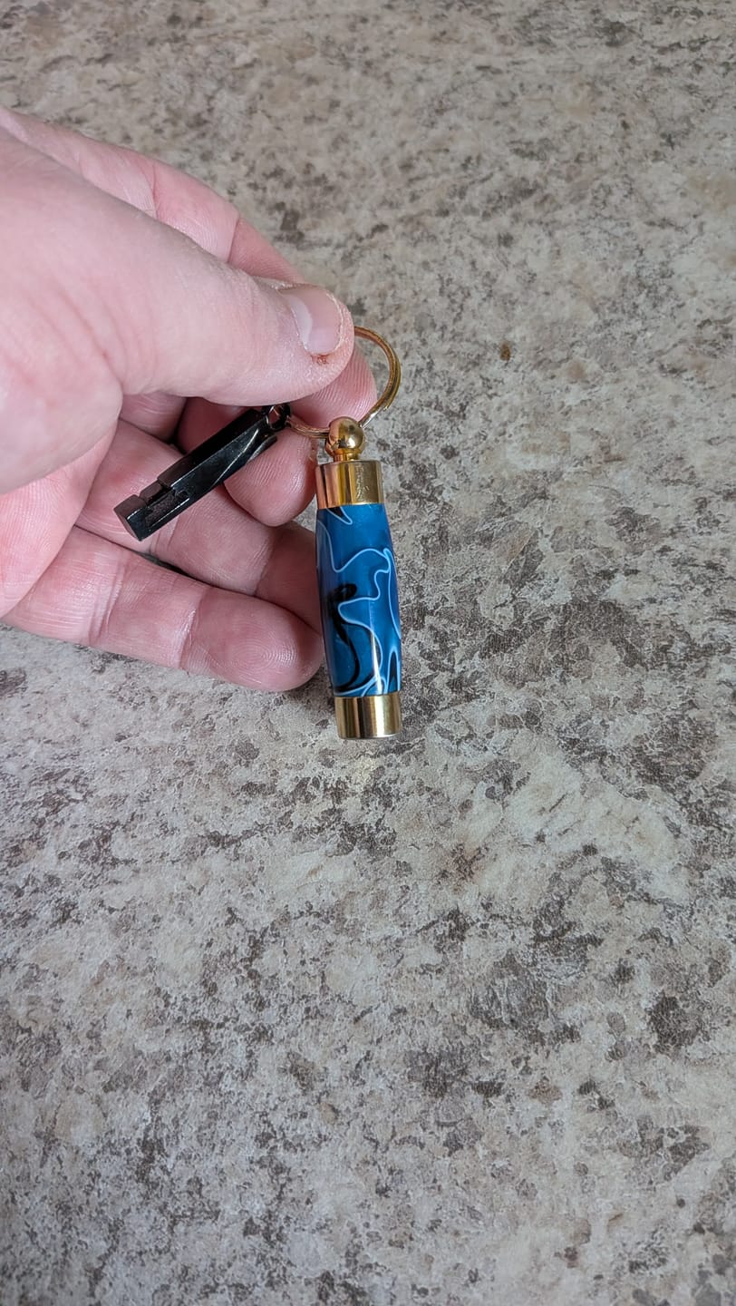 Customer photo review of Sapphire Acrylic Keepsake Urn For Cremation Ash or Hair