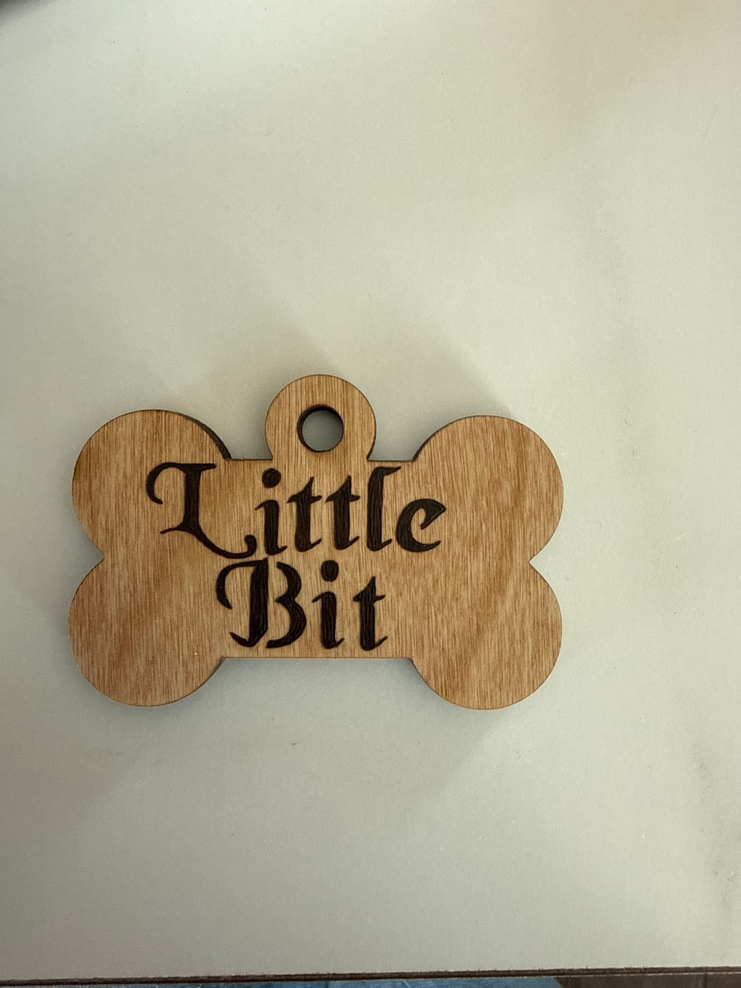 Customer photo review of Unfinished Wood Bone Dog Tag Shape | DIY Craft Cutout | up to 46" DIY