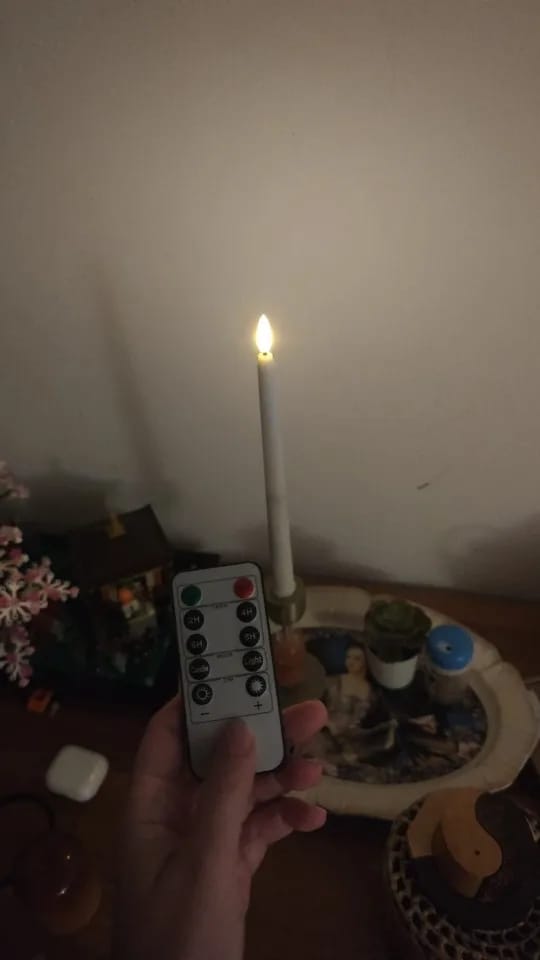 Customer photo review of Cozymere Flameless Taper Candles
