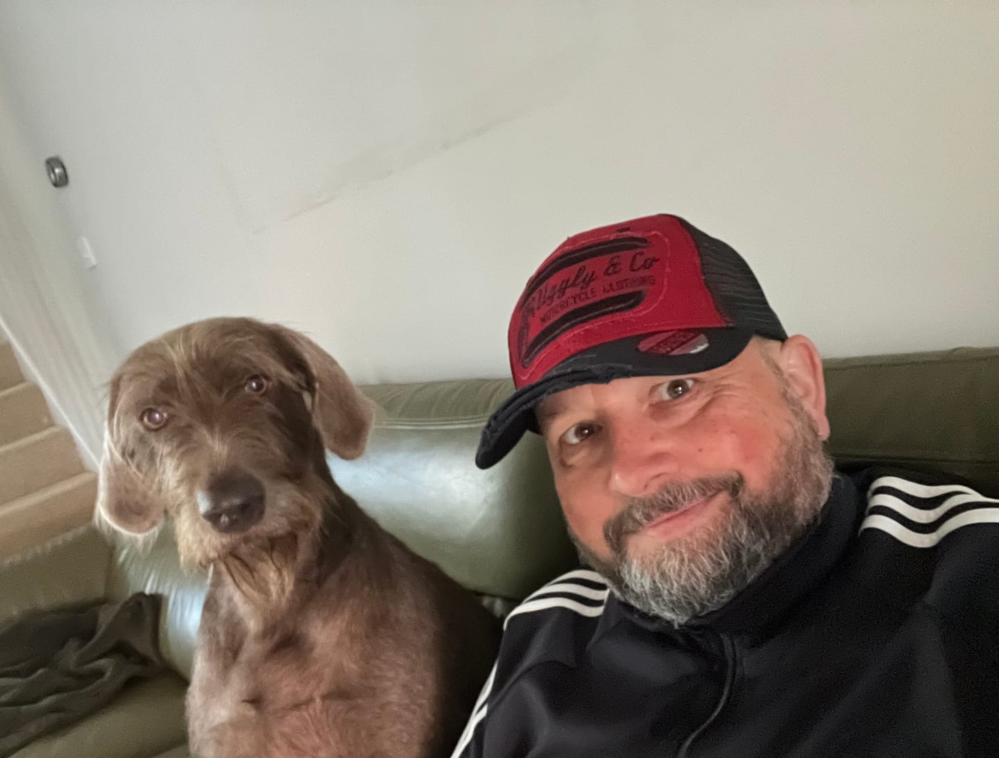 Customer photo review of Black & Red Flat Track Trucker Hat