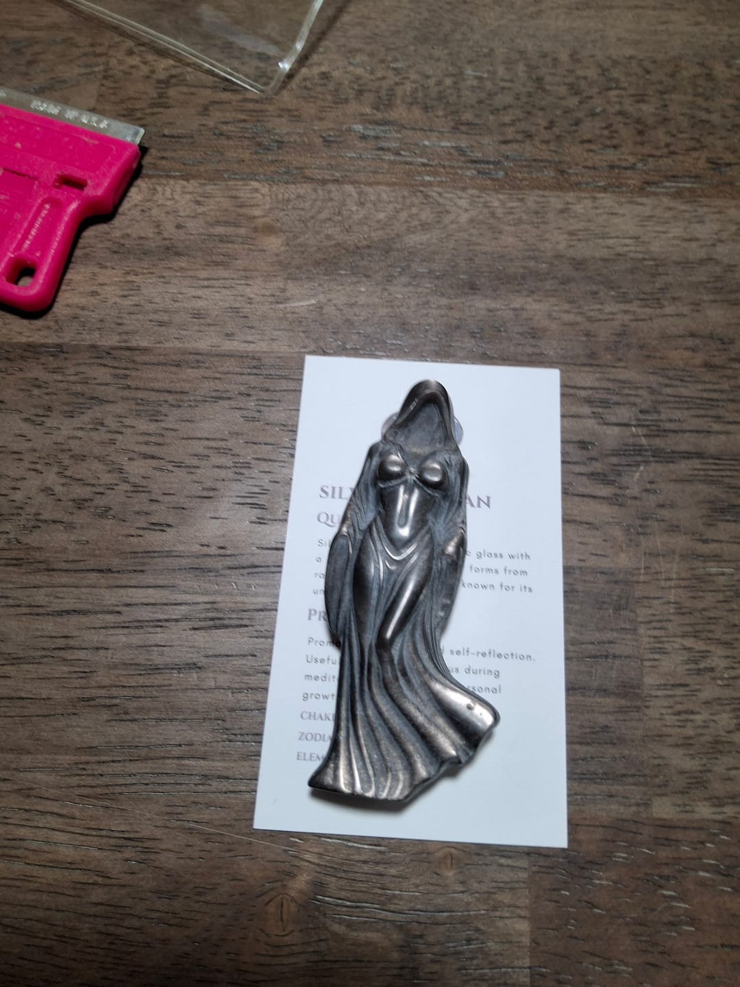 Customer photo review of A Slightly Imperfect Natural Silver Obsidian Cloaked Lady Carving