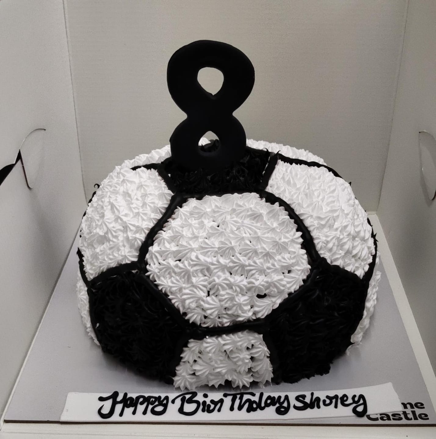 Customer photo review of Football Shaped Cake