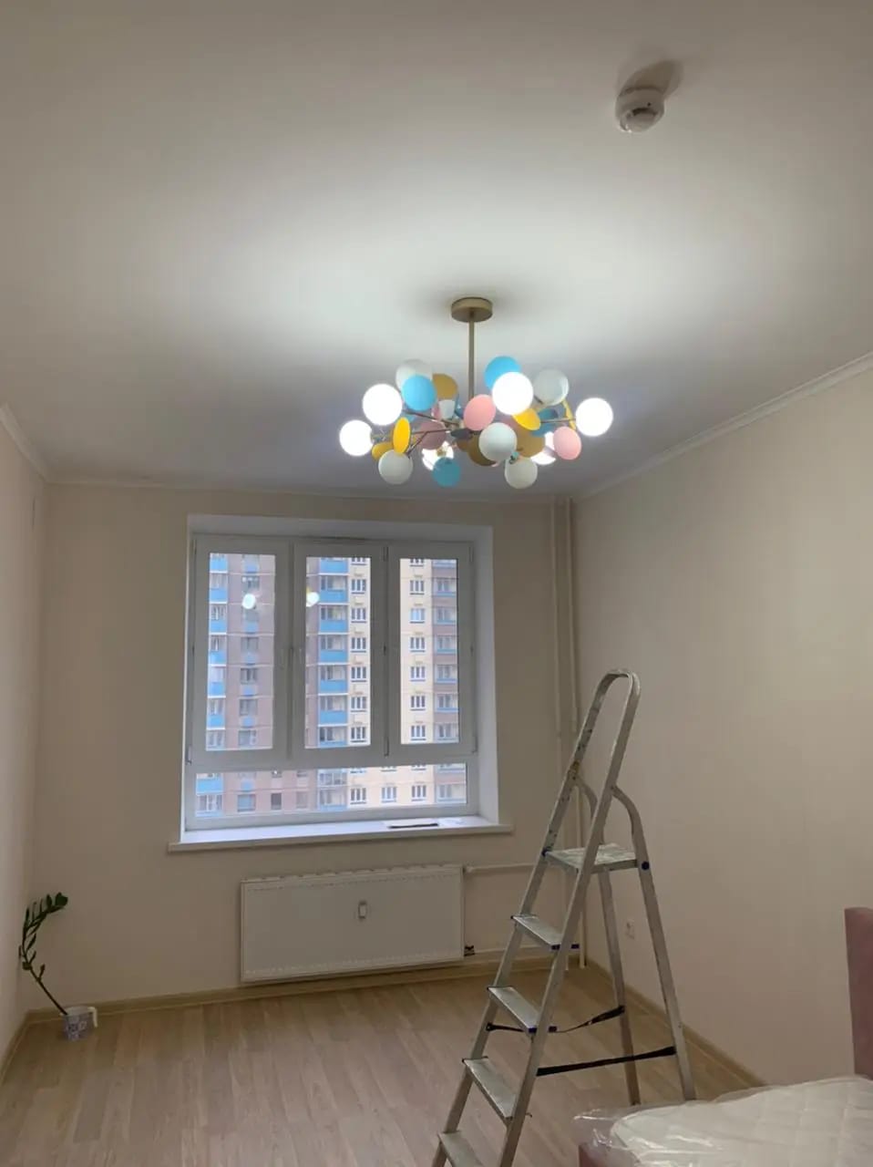 Customer photo review of Brass Chandelier with Glass Shades, Acrylic Discs, Iron Frame