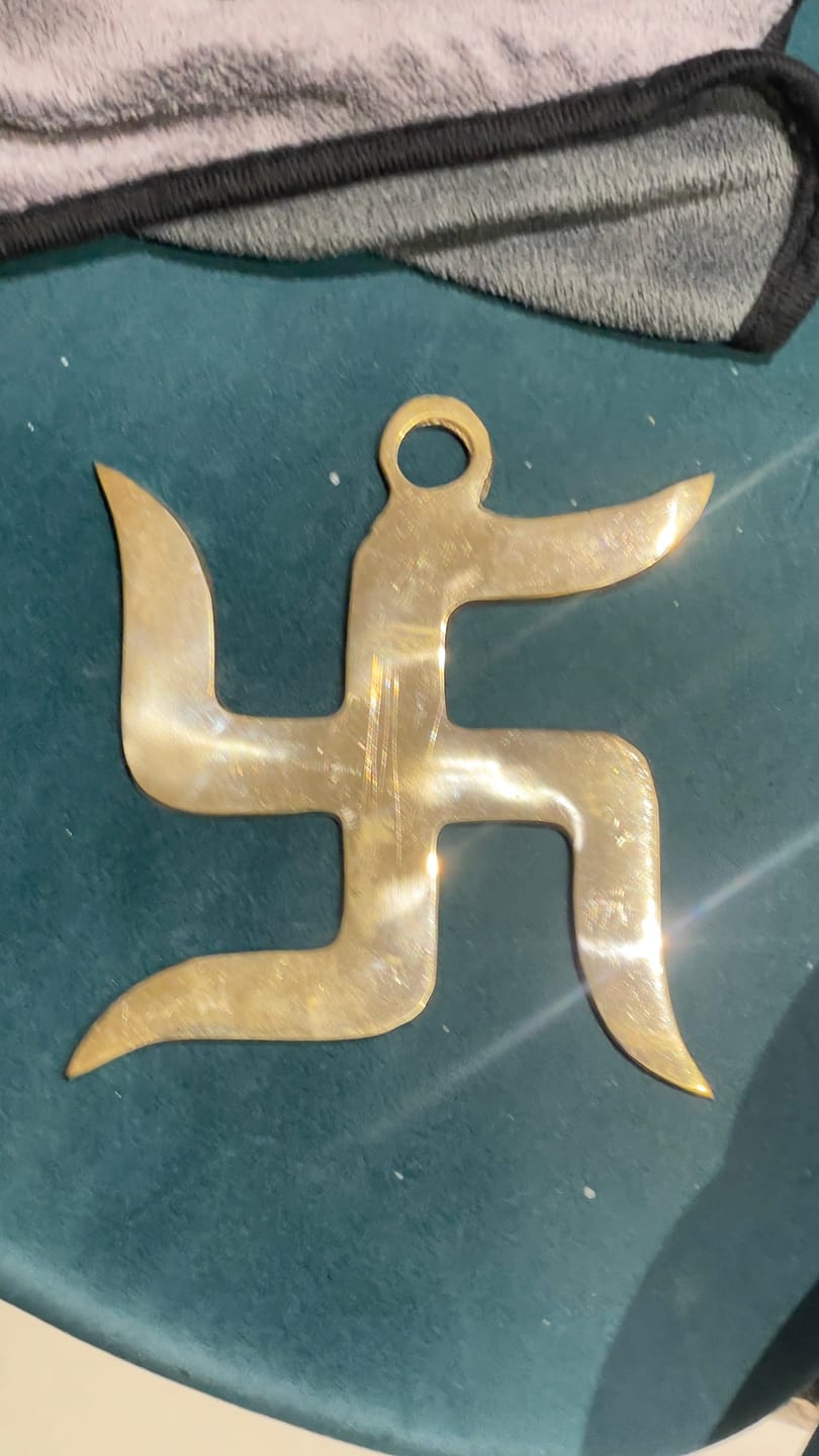 Customer photo review of Brass Swastik Wall Symbol | Vastu Remedy for Main Entrance & Auspicious Energy | 5 & 9 Inch