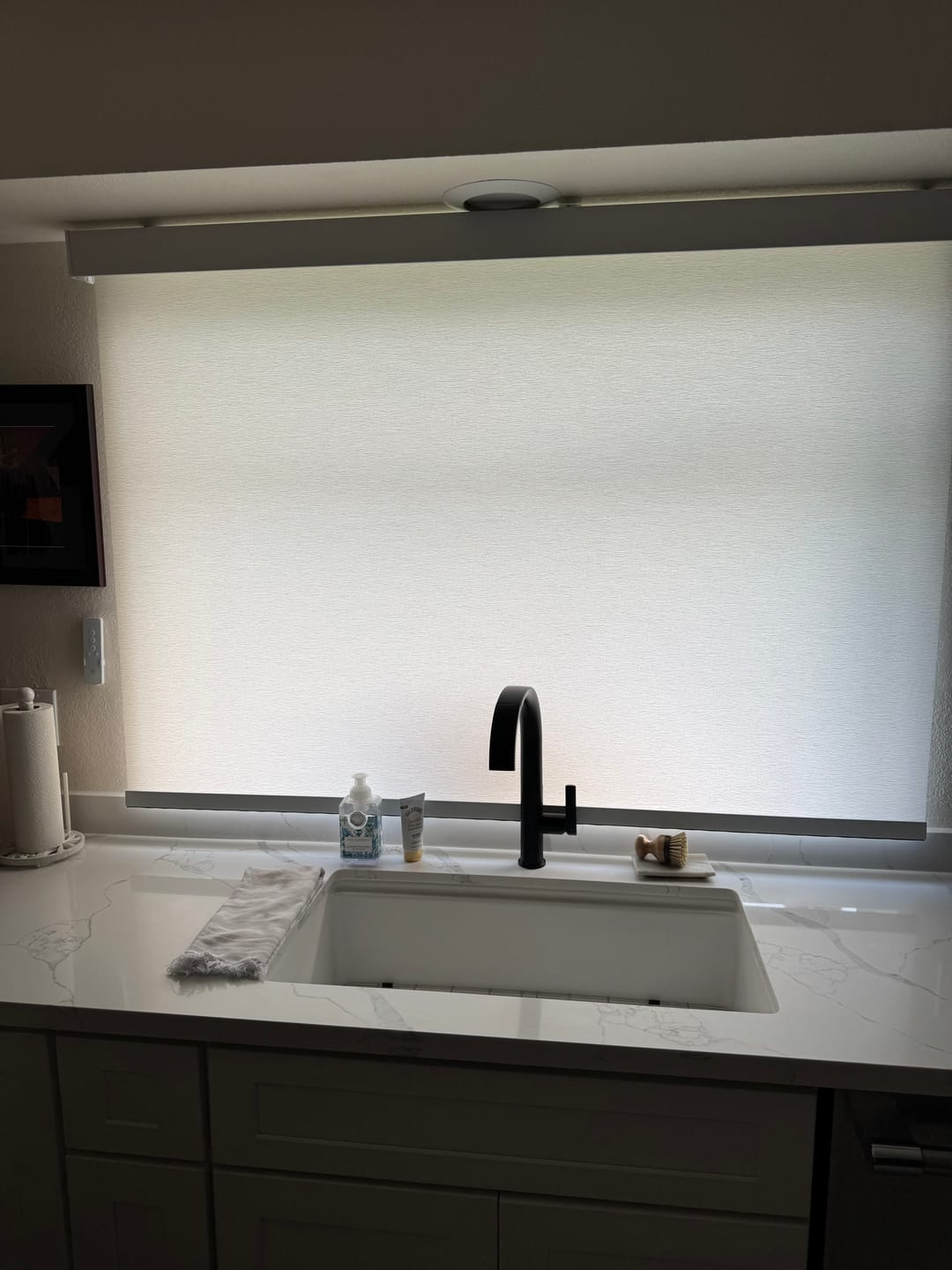 Customer photo review of SmartWings Motorized Light Filtering Roller Shades 70% Blackout Safari