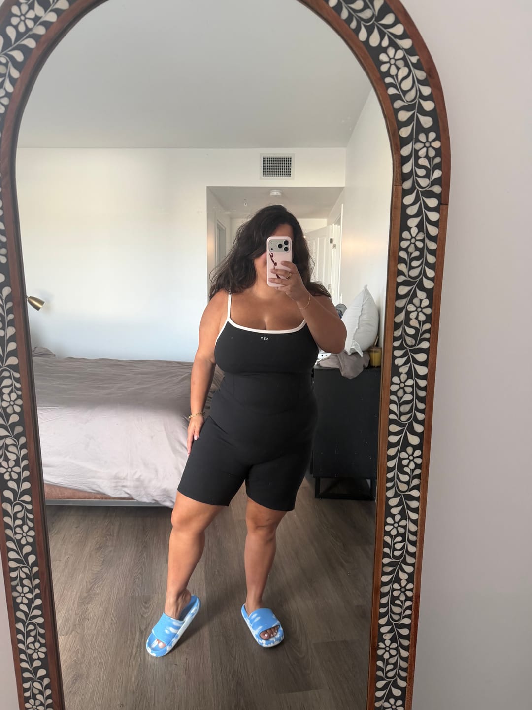 Customer photo review of The Shorts Onesie Black & Cream