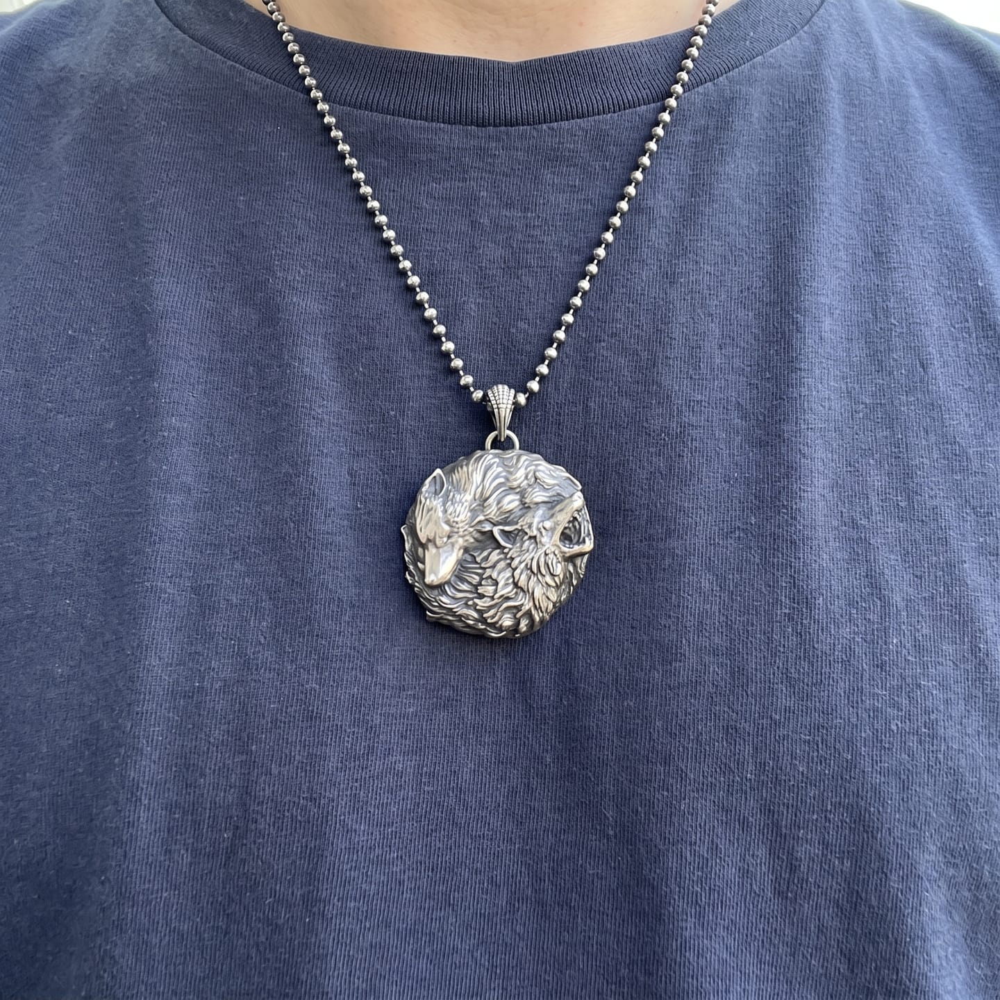 Customer photo review of Dual Wolf Yin Yang Pendant