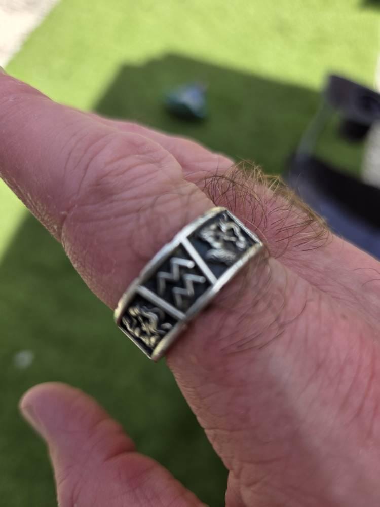 Customer photo review of Kneeling Aquarius Zodiac Ring