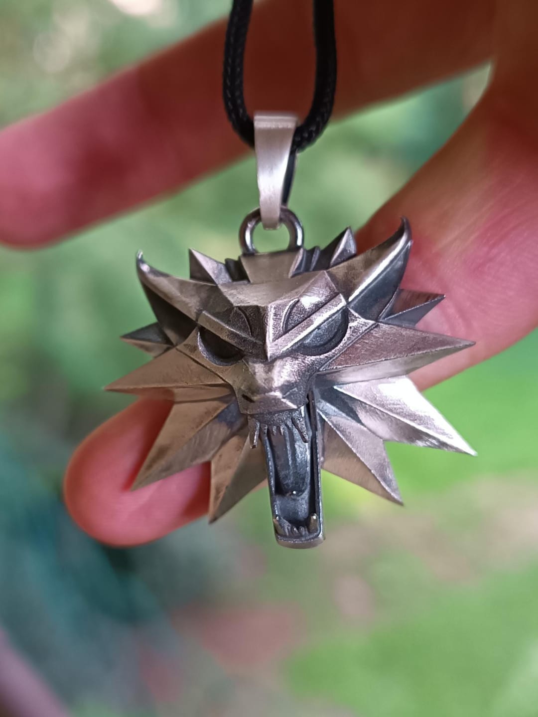 Customer photo review of Wolf School Emblem Pendant