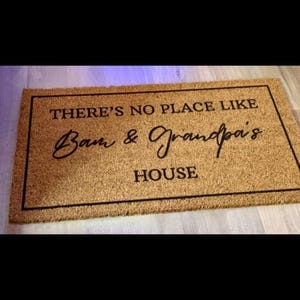 Customer photo review of There's No Place Like Nana's & Papa's House Doormat