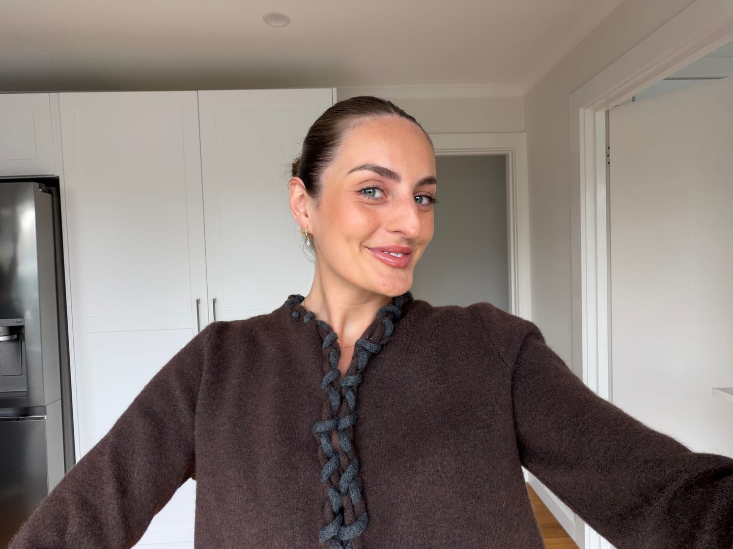 Customer photo review of Basic Sapphire Huggie Hoop Earrings