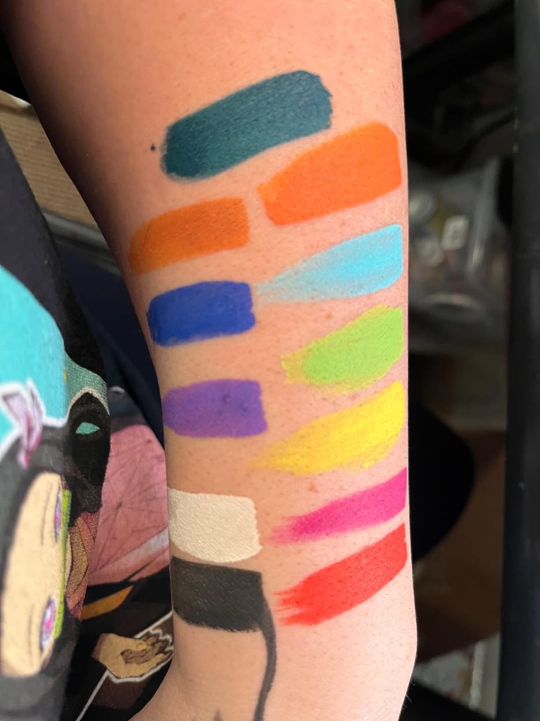 Customer photo review of Blue Squid Face Paint Stick - Water based Body Paint for Adults & Kids - Vegan Hypoallergenic Twist-Up Non-Toxic Makeup Stick for Cosplay, & SFX