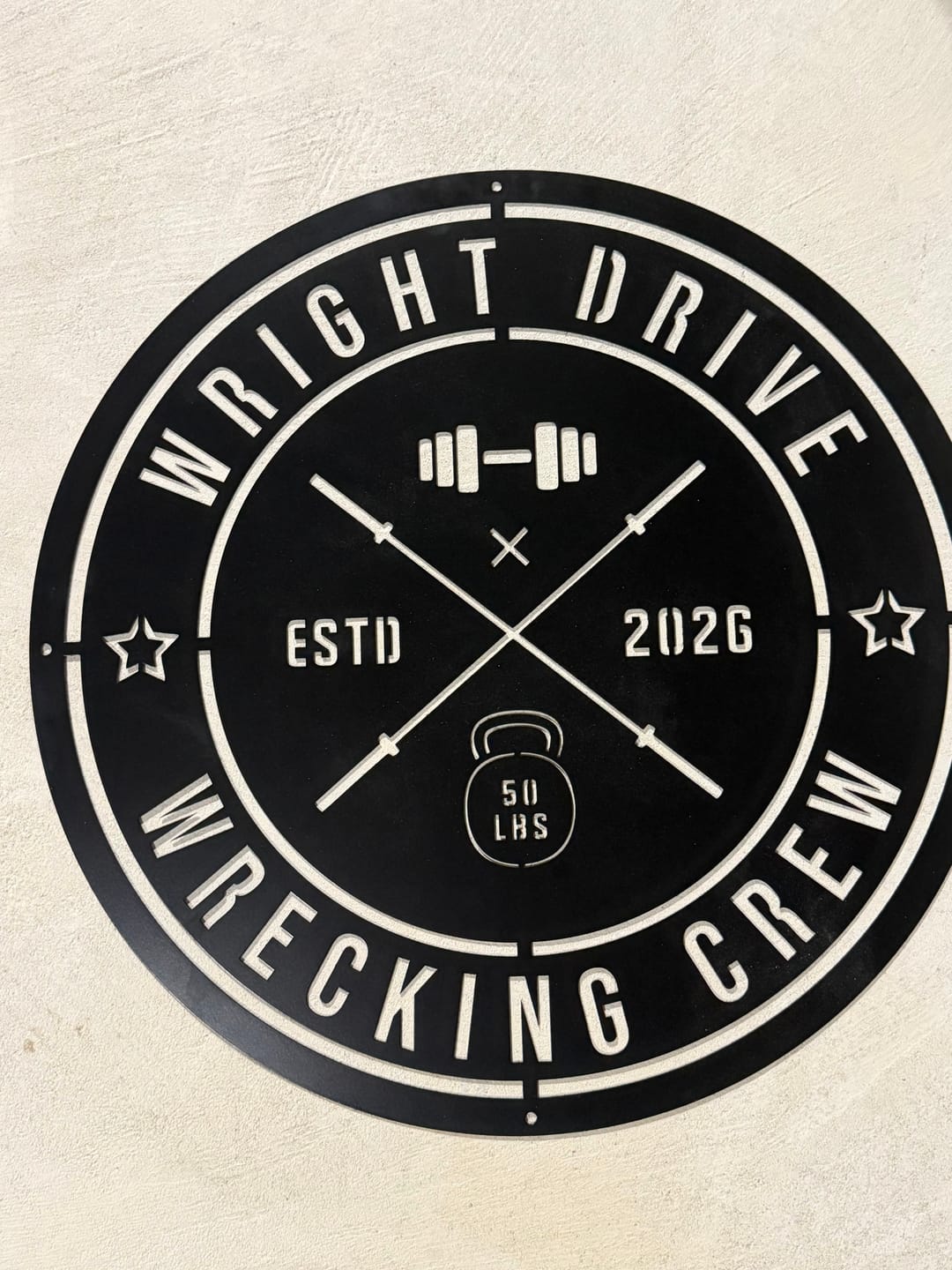 Customer photo review of Crossed Barbell Gym Sign