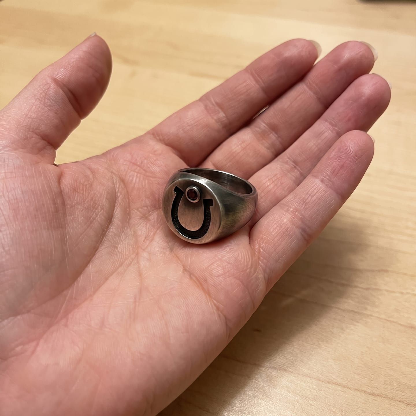 Customer photo review of Garnet Horseshoe Signet Ring