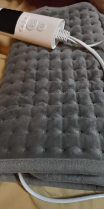 Customer photo review of Heating Pad with 6 Levels and Auto-Off Timer