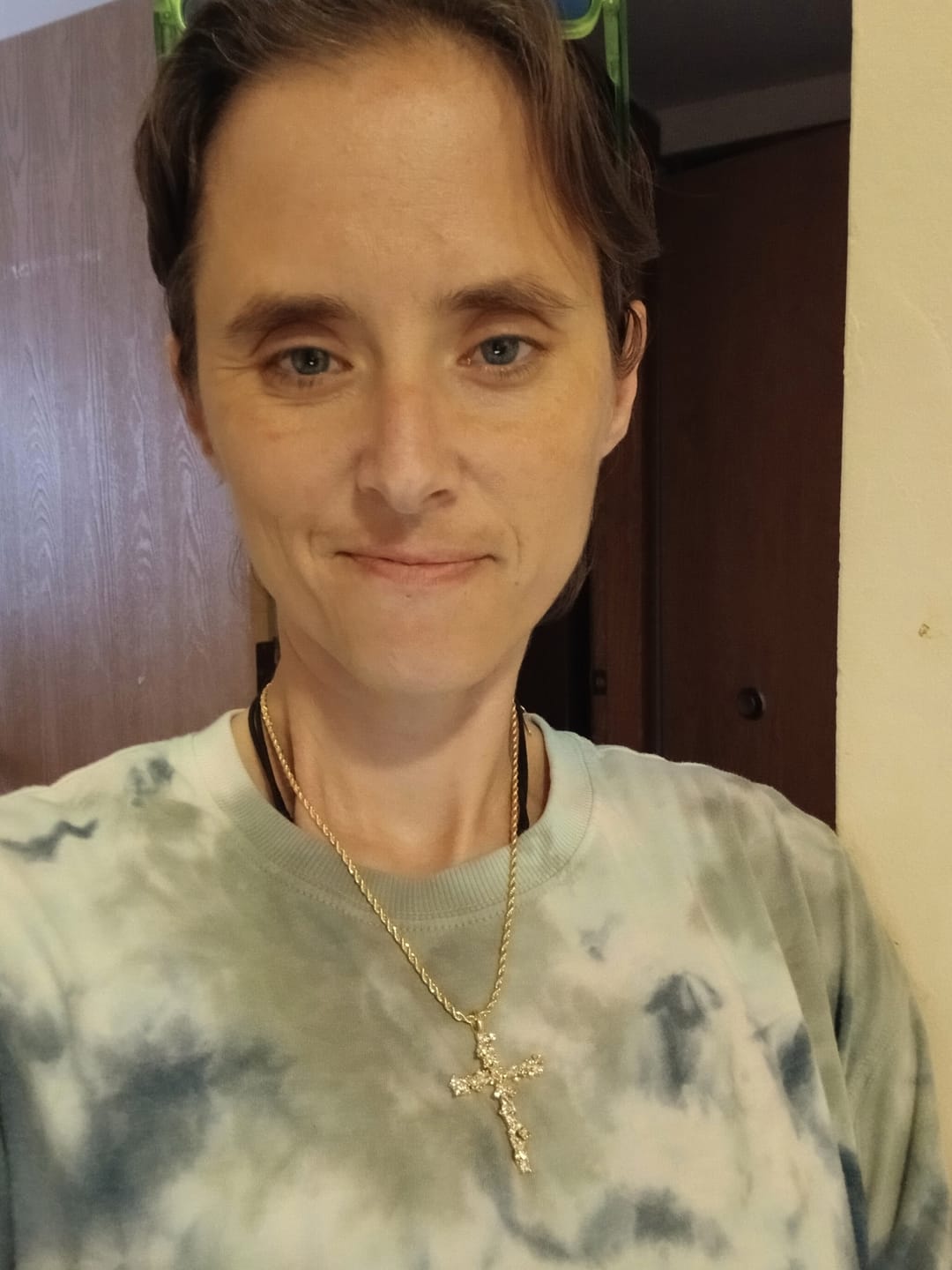 Customer photo review of FREE Today: Ornate Crystal Floral Cross Pendant Necklace: Token of Divine Shelter