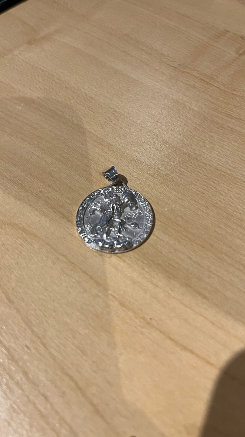 Customer photo review of Pouring Aquarius Zodiac Pendant
