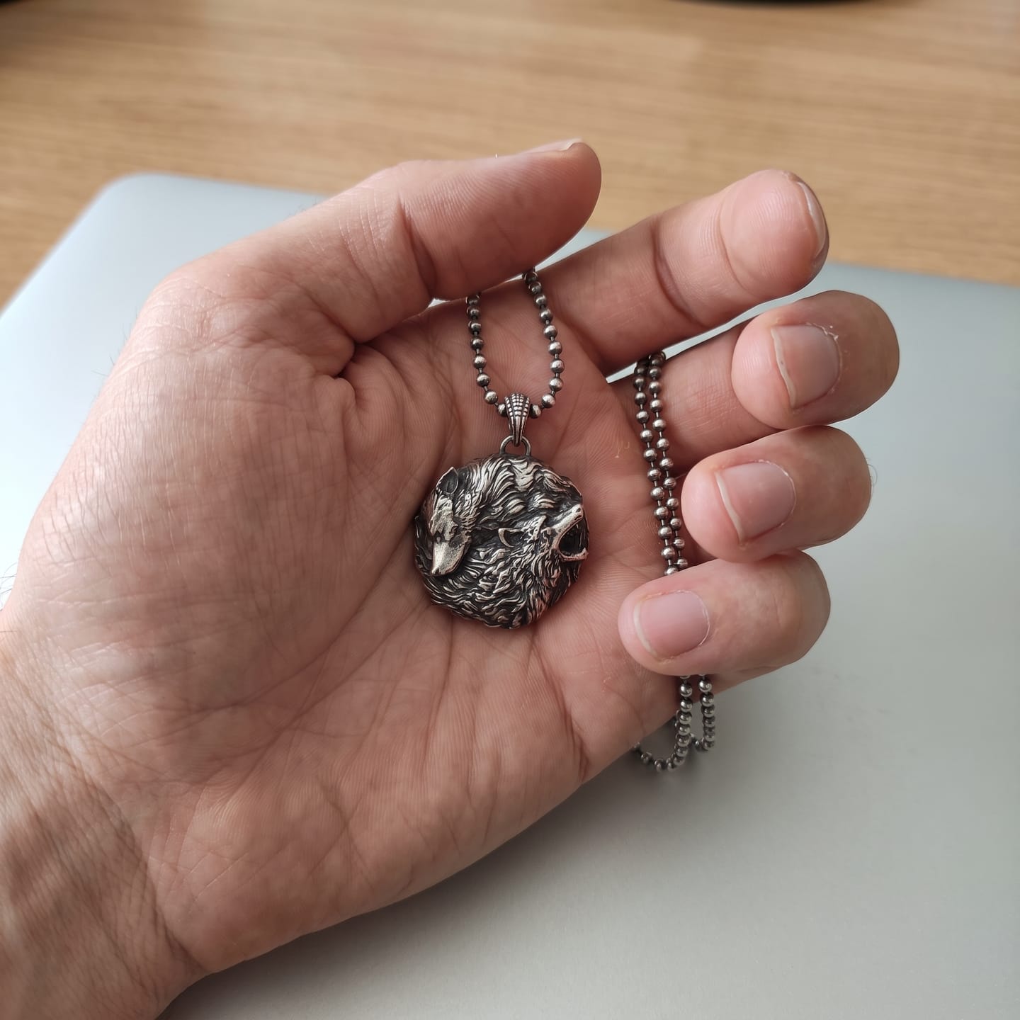 Customer photo review of Dual Wolf Yin Yang Pendant