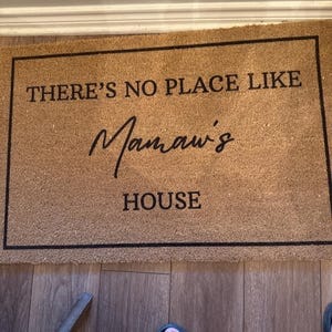 Customer photo review of There's No Place Like Nana's & Papa's House Doormat