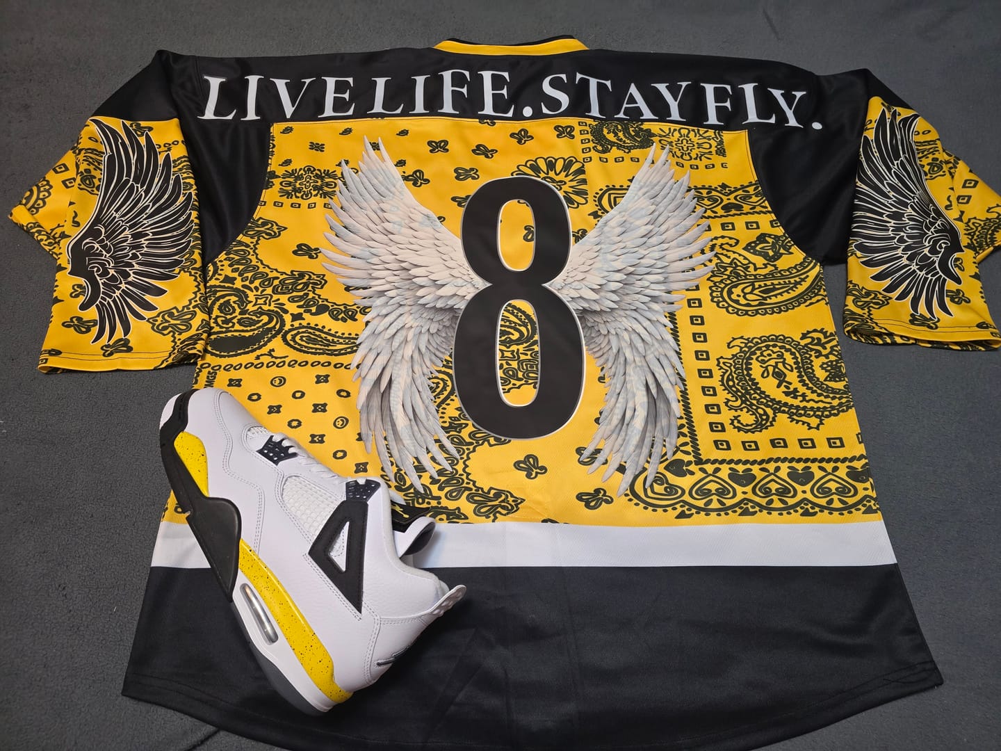 Customer photo review of Custom Black Gold White Cashew Flower Graffiti Pattern V-Neck Hockey Jersey