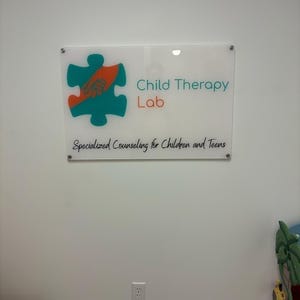 Customer photo review of Acrylic Business Logo Sign