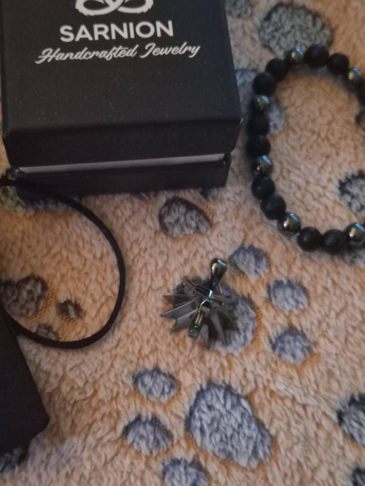 Customer photo review of Wolf School Emblem Pendant