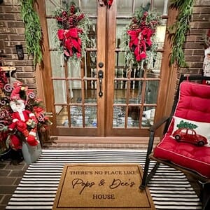 Customer photo review of There's No Place Like Nana's & Papa's House Doormat