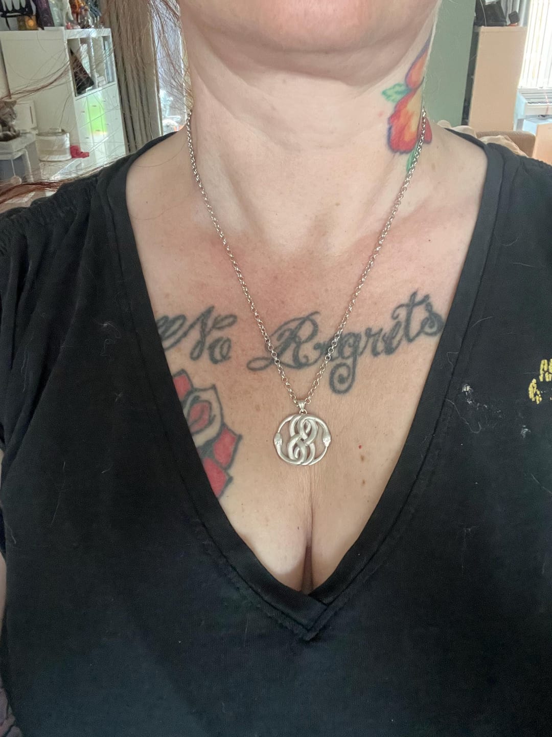 Customer photo review of Double Snake Pendant