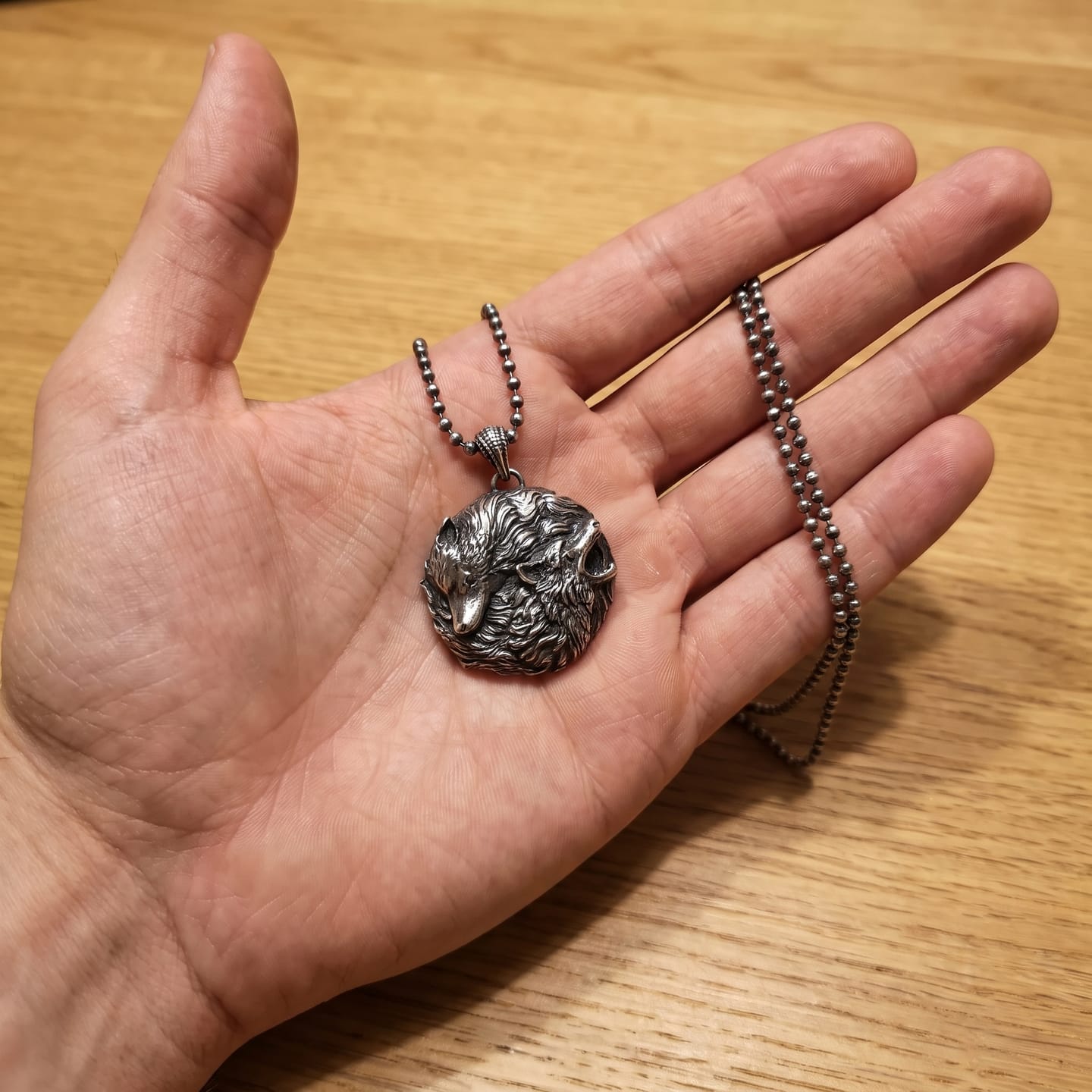 Customer photo review of Dual Wolf Yin Yang Pendant