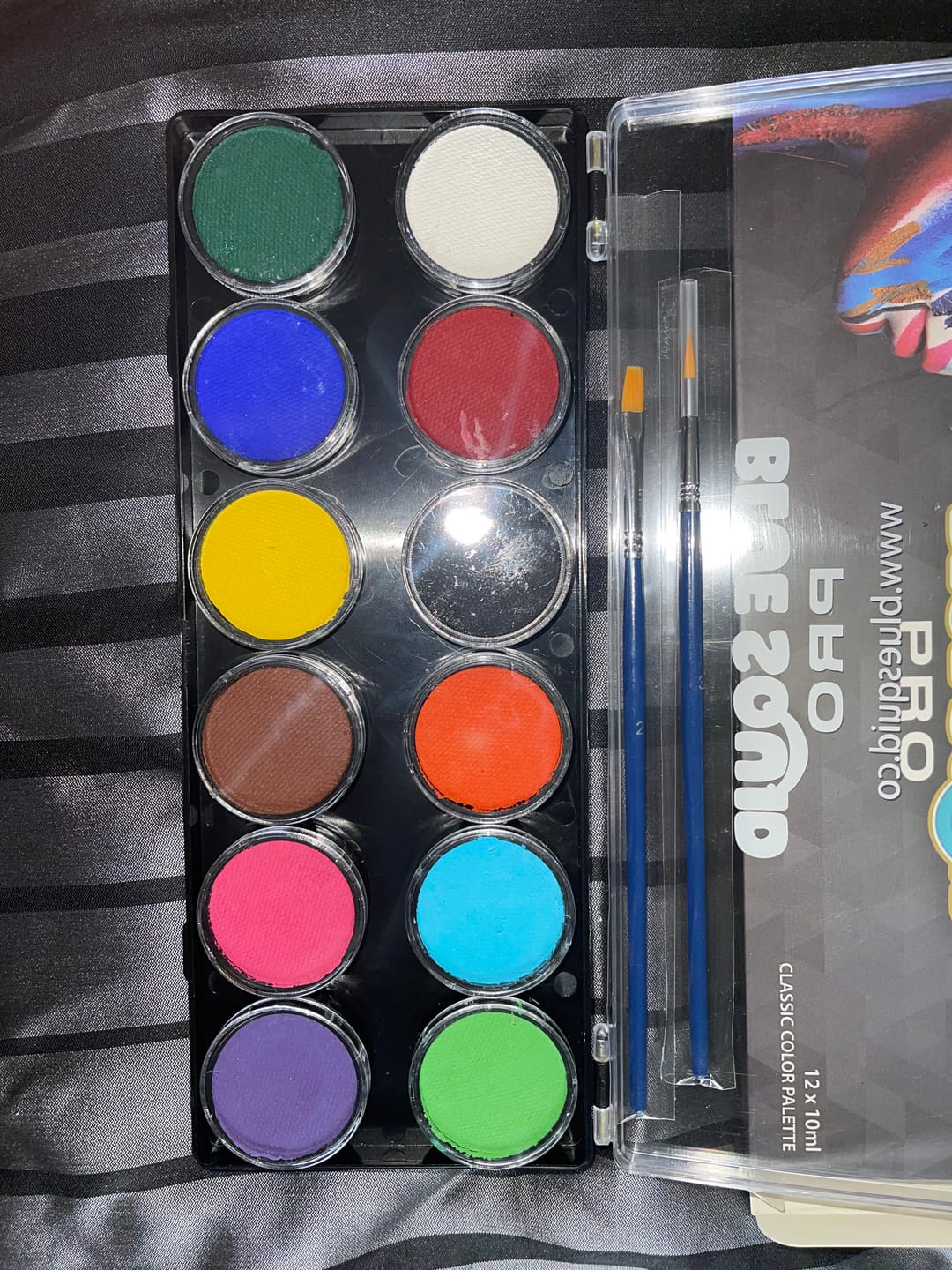 Customer photo review of Blue Squid PRO Face Paint Stick - Waterproof Body Paint for Adults & Kids Eye Black Baseball, Softball - Vegan Hypoallergenic Twist-Up Non-Toxic Makeup Stick for Cosplay, Sports & SFX