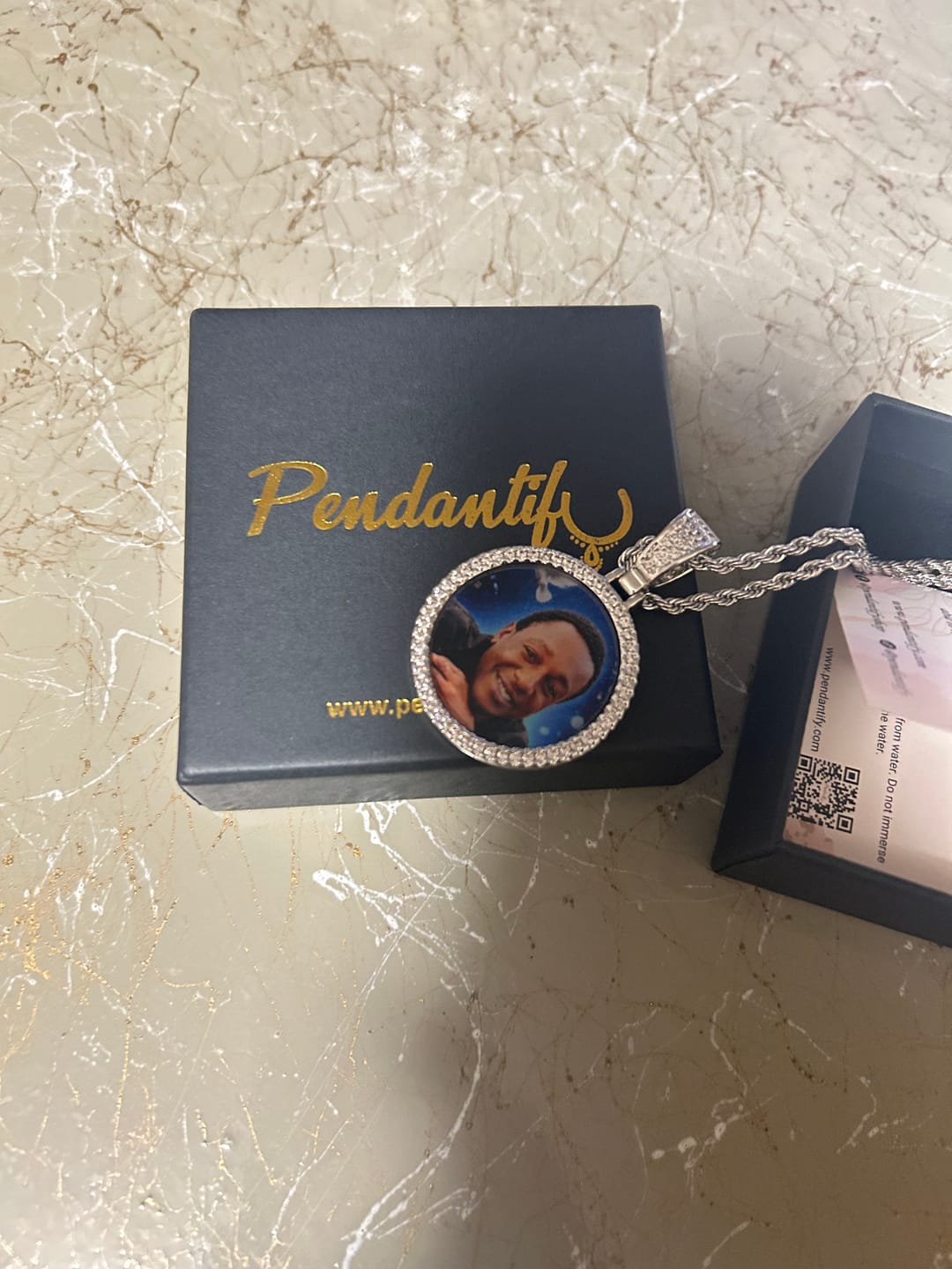 Customer photo review of Custom Diamond Studded Angel Wing Photo Necklace