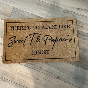 Customer photo review of There's No Place Like Nana's & Papa's House Doormat
