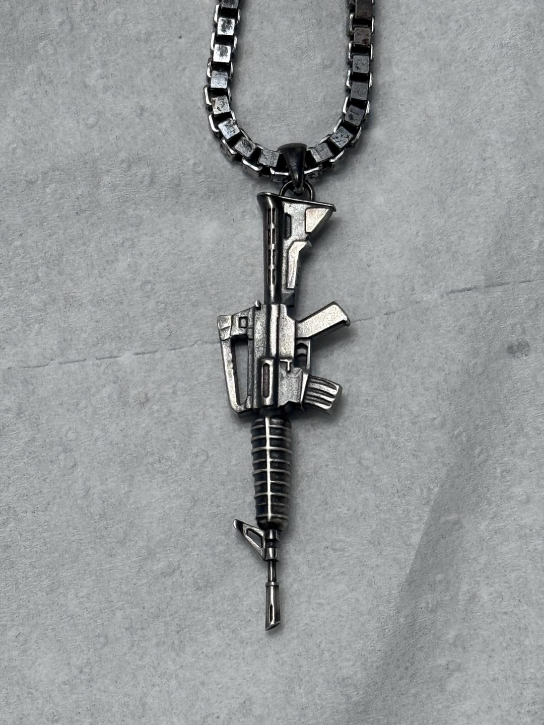 Customer photo review of Assault Rifle Pendant