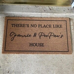 Customer photo review of There's No Place Like Nana's & Papa's House Doormat