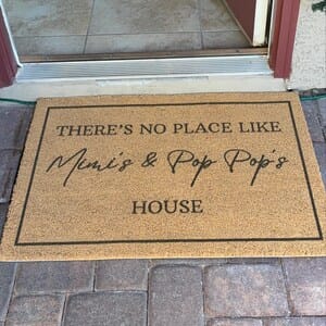 Customer photo review of There's No Place Like Nana's & Papa's House Doormat