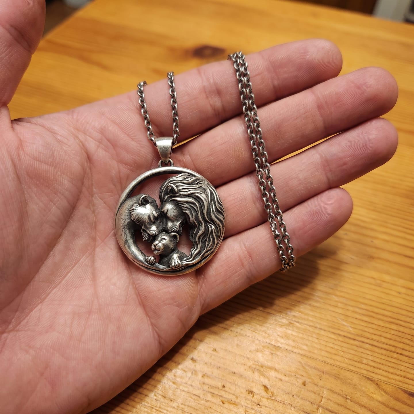 Customer photo review of Lioness and Cub Medallion Pendant