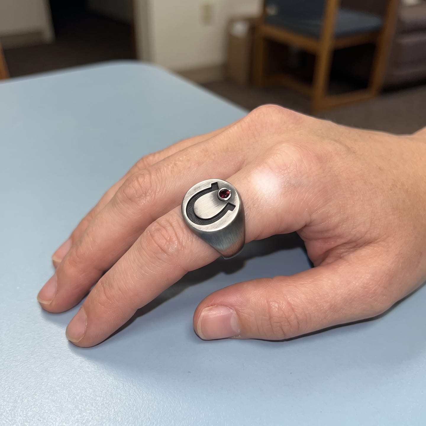 Customer photo review of Garnet Horseshoe Signet Ring