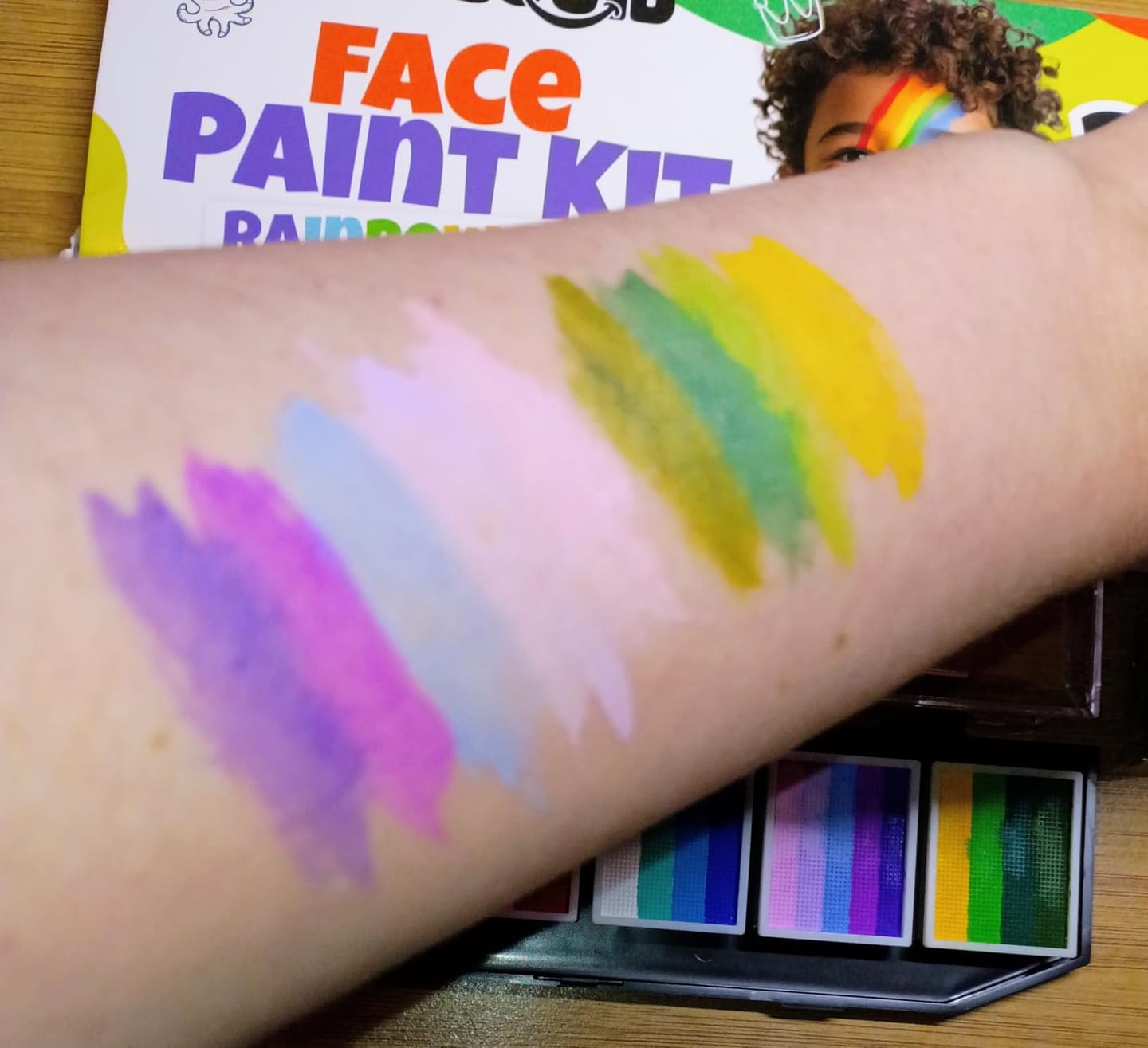Customer photo review of Blue Squid Face Painting Kit for Kids – 60g/2.12oz Split Cake Face Paint Palette, One Stroke Rainbow Colors, with Brushes & Stencils - Non-Toxic, Water Activated - Kids Party & Halloween Makeup Kit