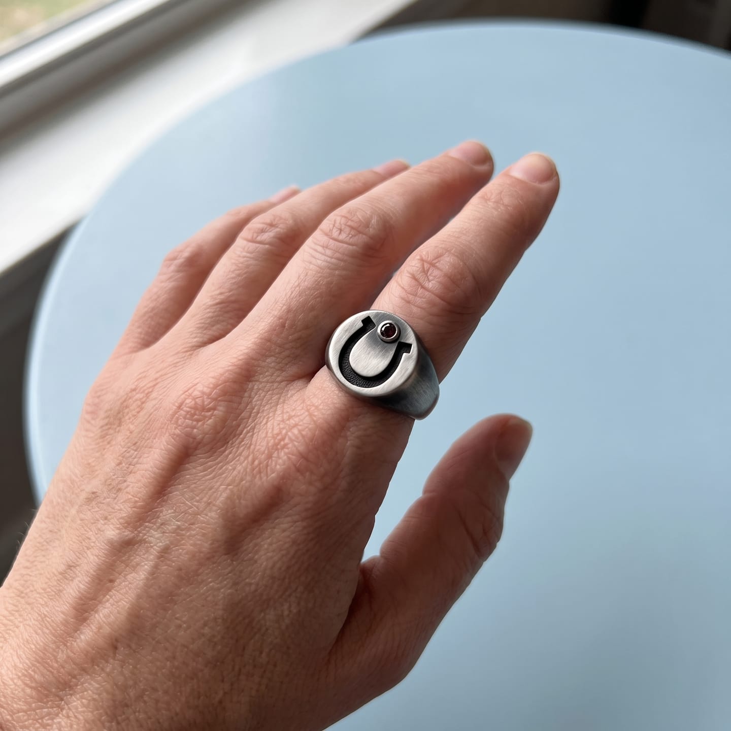 Customer photo review of Garnet Horseshoe Signet Ring
