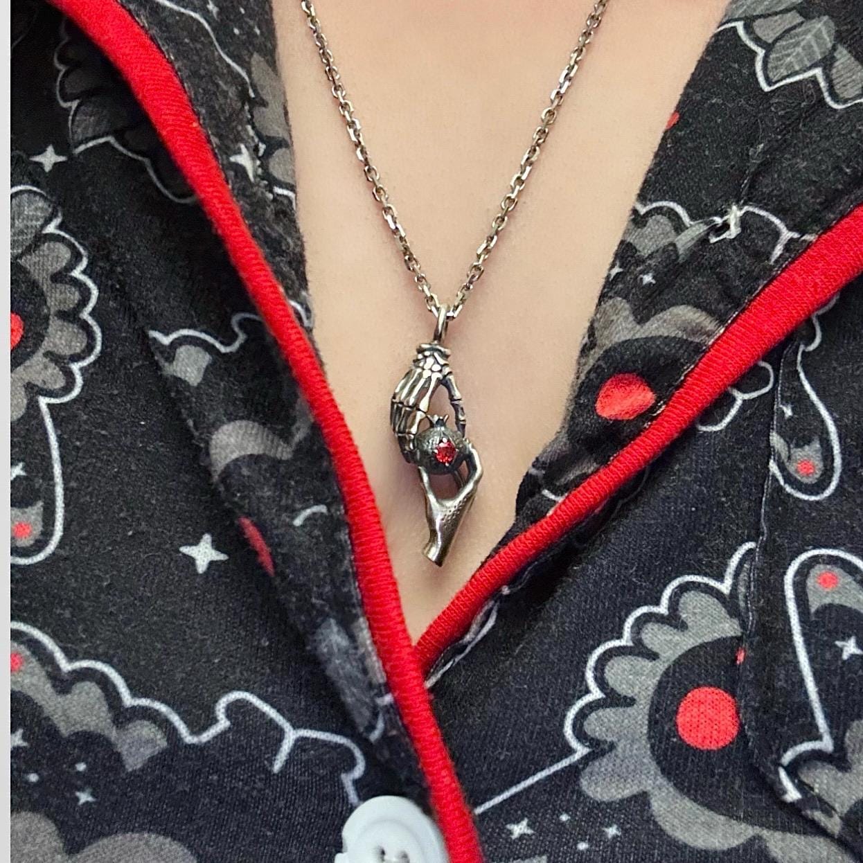 Customer photo review of Hades Persephone Hands Pendant