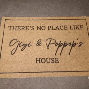 Customer photo review of There's No Place Like Nana's & Papa's House Doormat