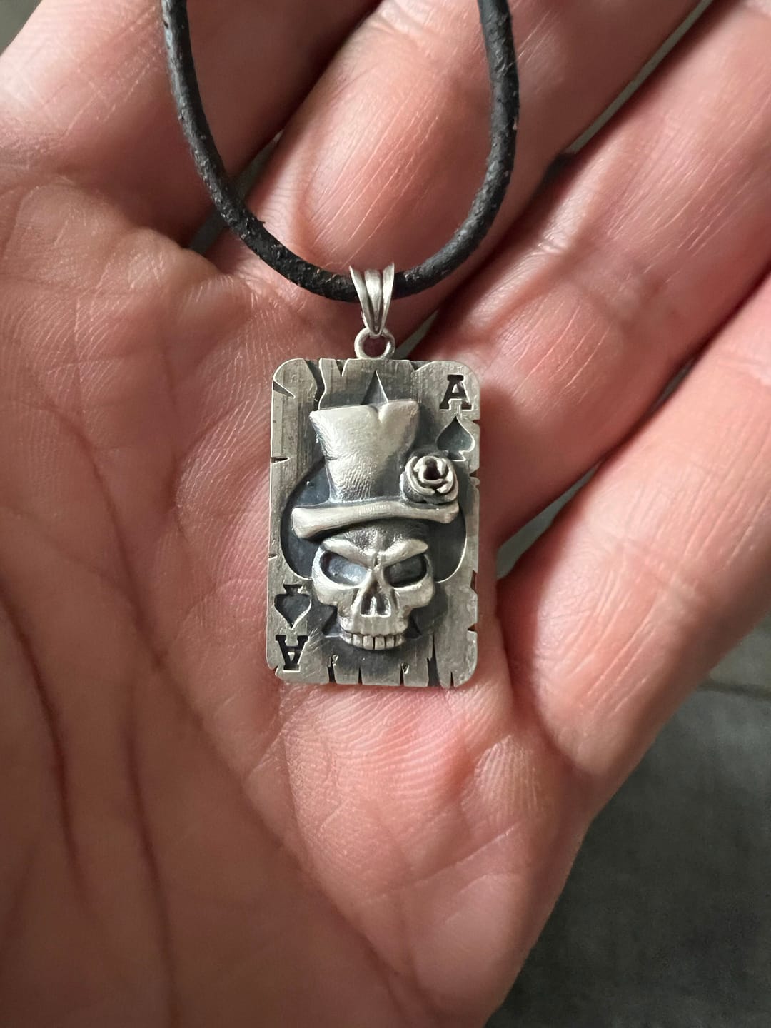Customer photo review of Ace of Spades Skull Pendant
