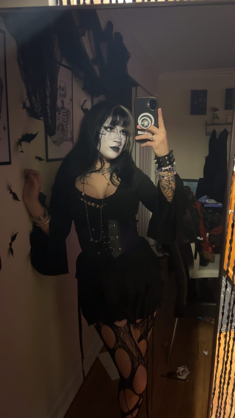 Customer photo review of Selyne Ruched Ruffle Drape Bell Sleeve Top